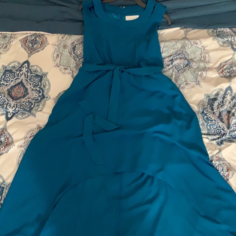 Teal color dress short in front long in back